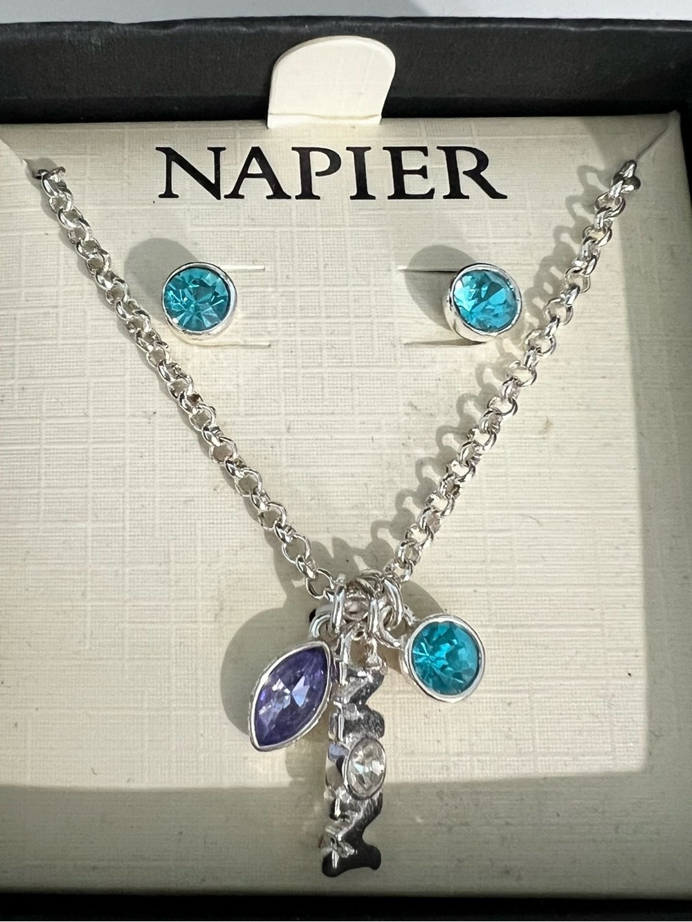 Napier necklace and earrings set mom
Silvertone pierced stud earrings blue stone